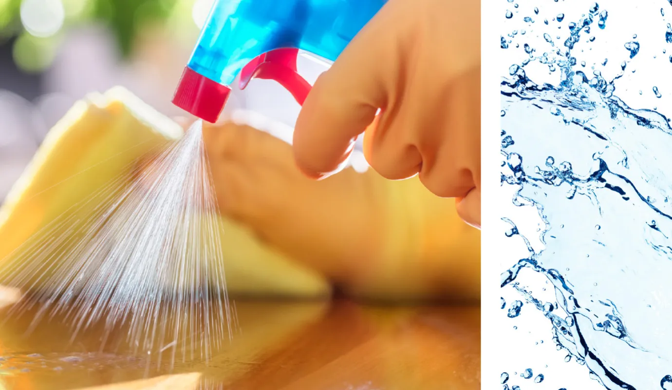 Spray bottle releasing mist onto wooden surface.