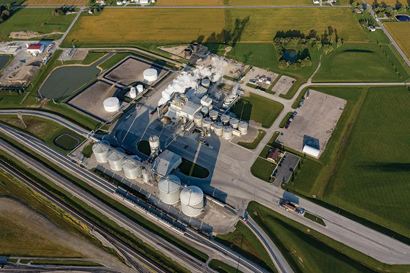 Industrial plant with tanks and smokestacks