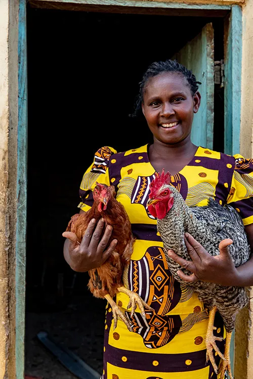 Stella holding chickens
