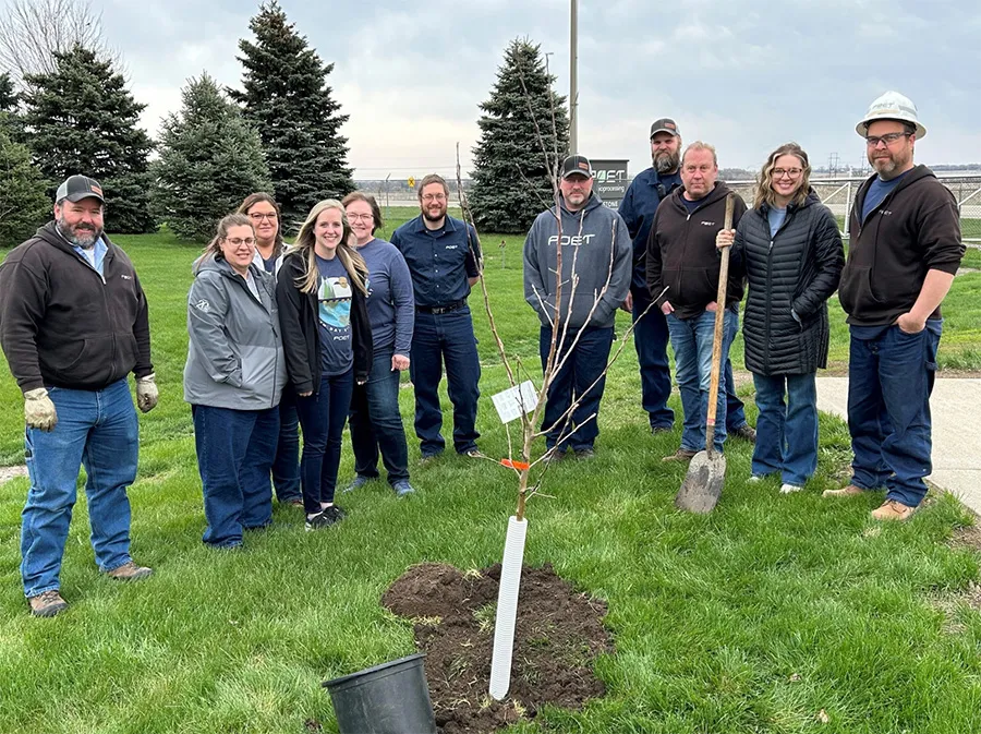 A team at POET Bioprocessing – Big Stone celebrates Earth Day by planting trees