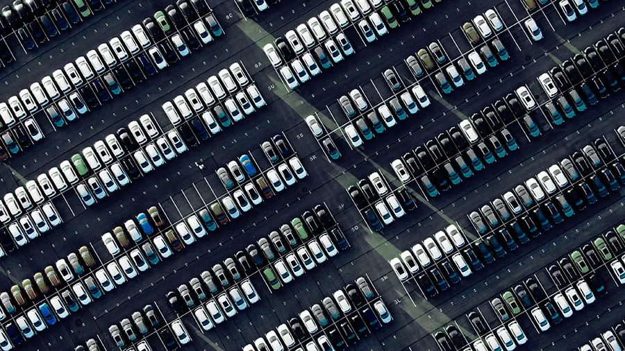 Aerial view of a crowded parking lot.
