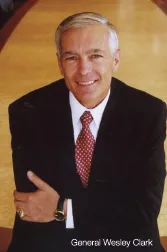 General Wesley Clark smiling at the camera