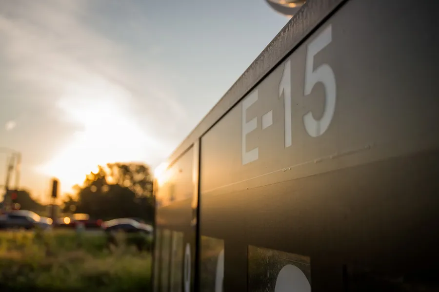 Close-up of metal sign displaying 15.