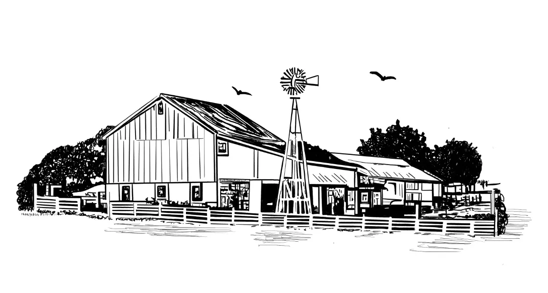 Barn and windmill on a farm behind a fence.