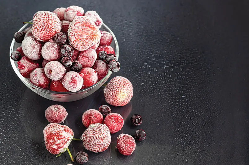 A bowl of frozen fruit