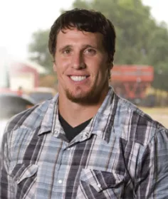 Chad Greenway headshot smiling at the camera