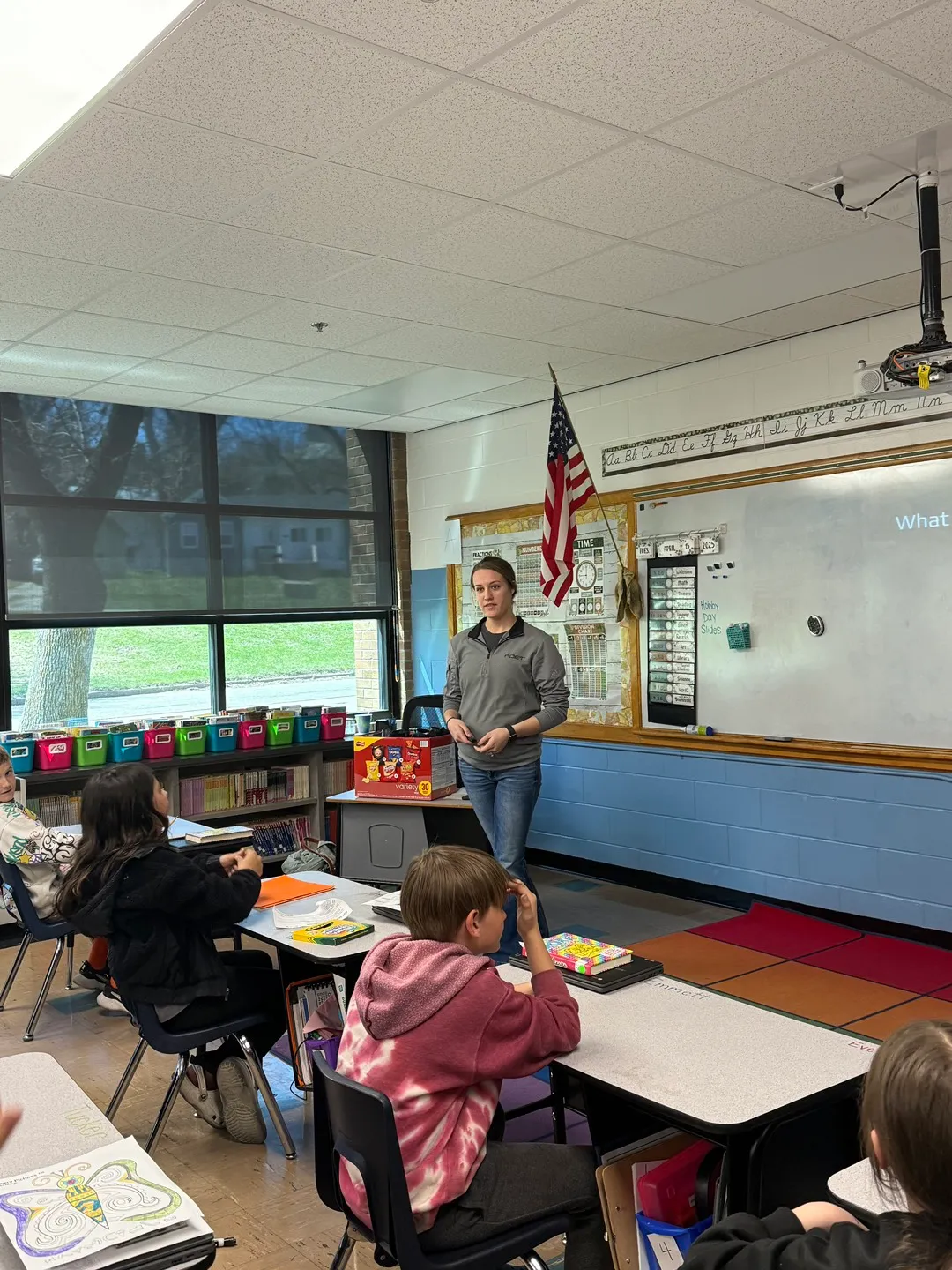 A teacher and students in the classroom 