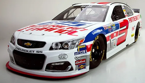White Chevrolet SS stock car with sponsor decals