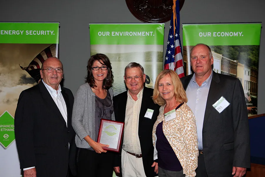 Lester Voegeli pictured center next to then-Representative Kristi Noem with  the South Dakota Delegation at a D.C. Reception in 2012