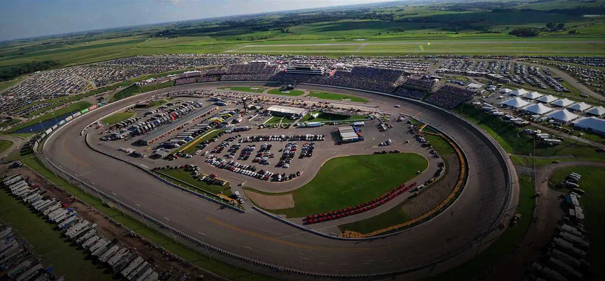 Aerial view of a crowded oval race track