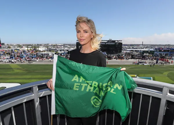 Actress Charlize Theron waves the green flag on Feb. 18, 2018 at Daytona.