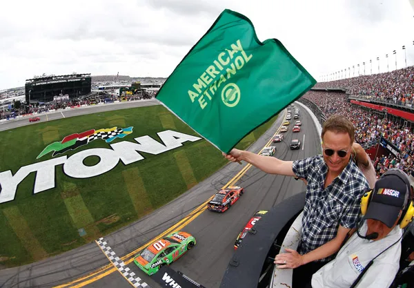Actor Gary Sinise waves the green flag at Daytona.