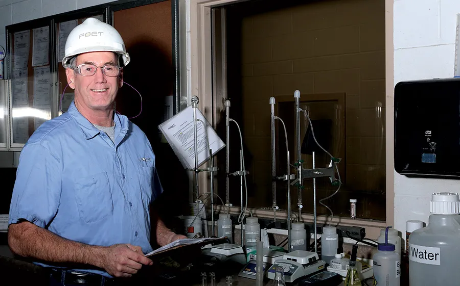Dan in hard hat inside a lab
