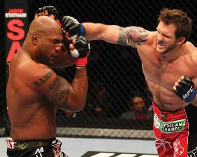 UFC fighters exchange punches in the octagon