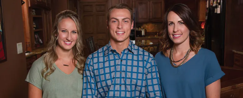 Miranda, Austin and Alyssa Broin smiling at the camera