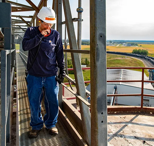 Jill Peterson, Materials Manager, radios down to POET Iowa Falls' grain team