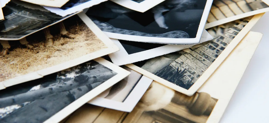 Some photos on a white surface