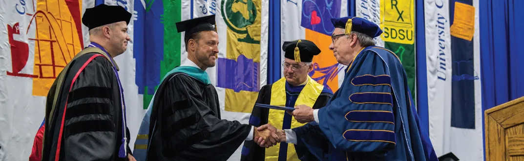 Jeff Broin receives an honorary doctorate from South Dakota State University