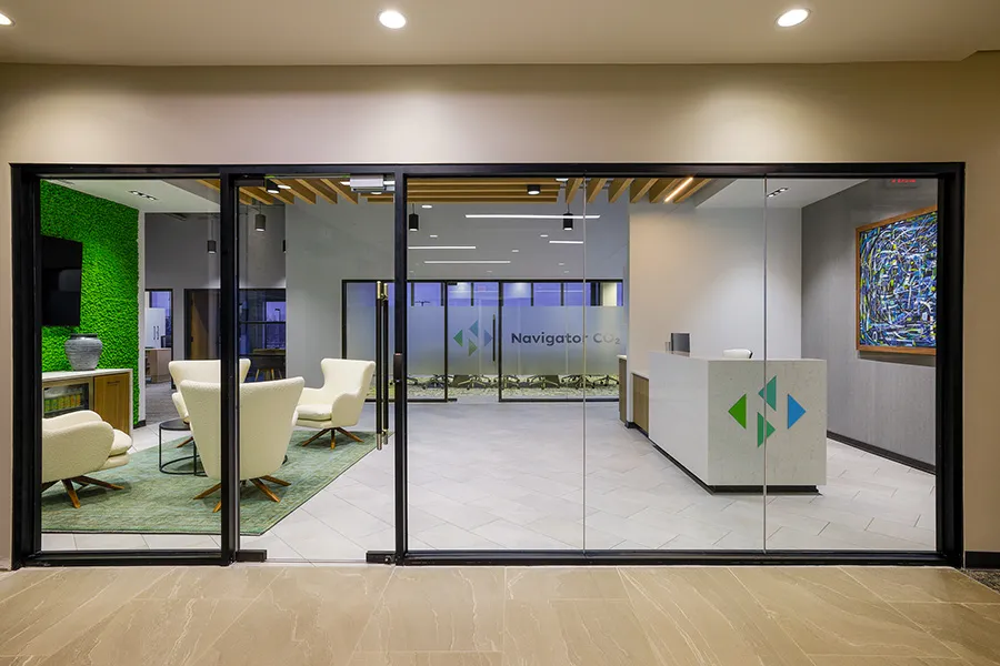 Office lobby with moss wall and Navigator CO2 sign