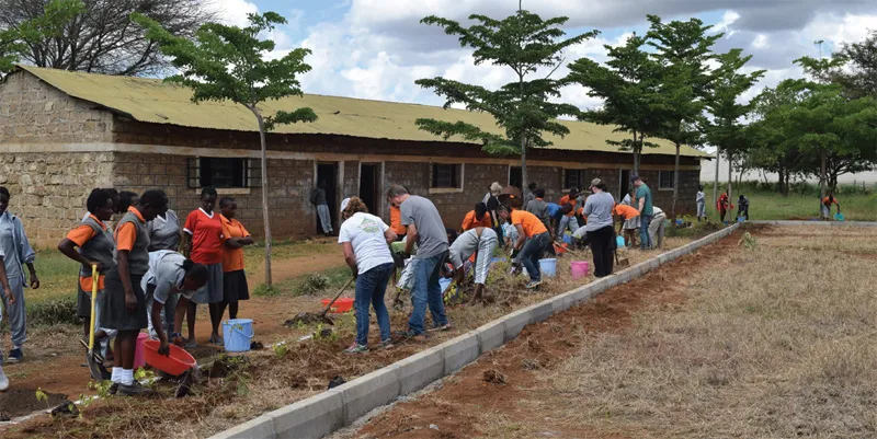 A group of people gardening