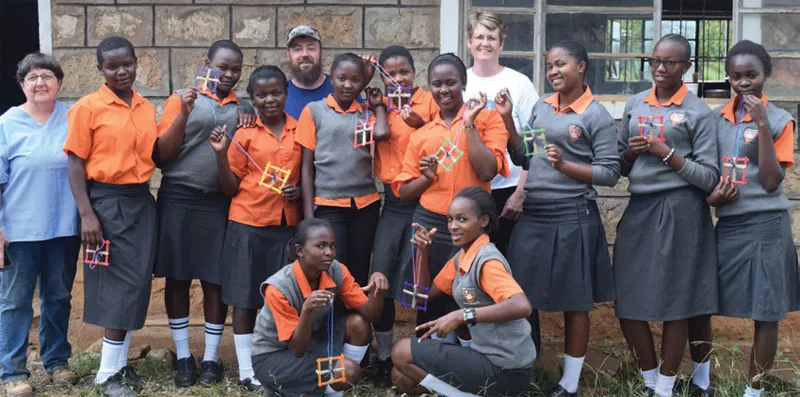 Students holding their crafts 