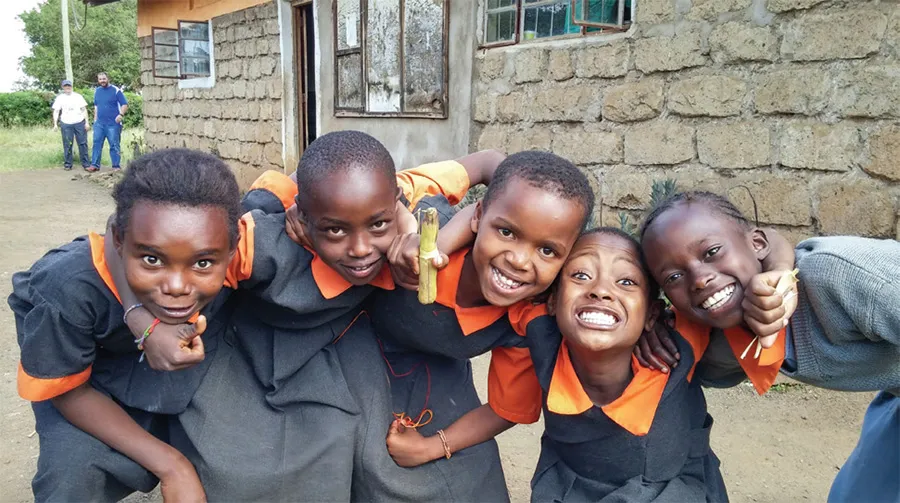 Smiling children looking at the camera