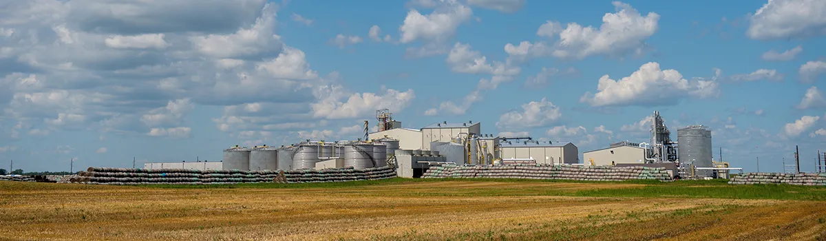 Industrial plant with silos under a blue sky