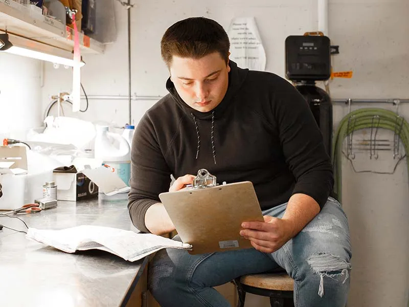 Man holding a clipboard