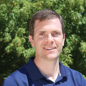 Professional headshot of a person
