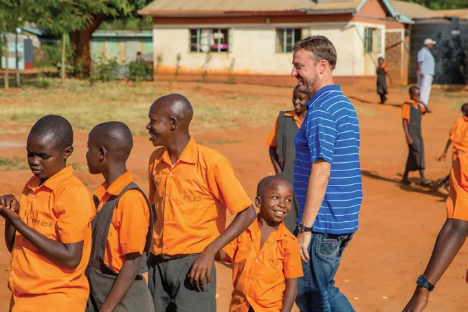 Jeff and students playing outside