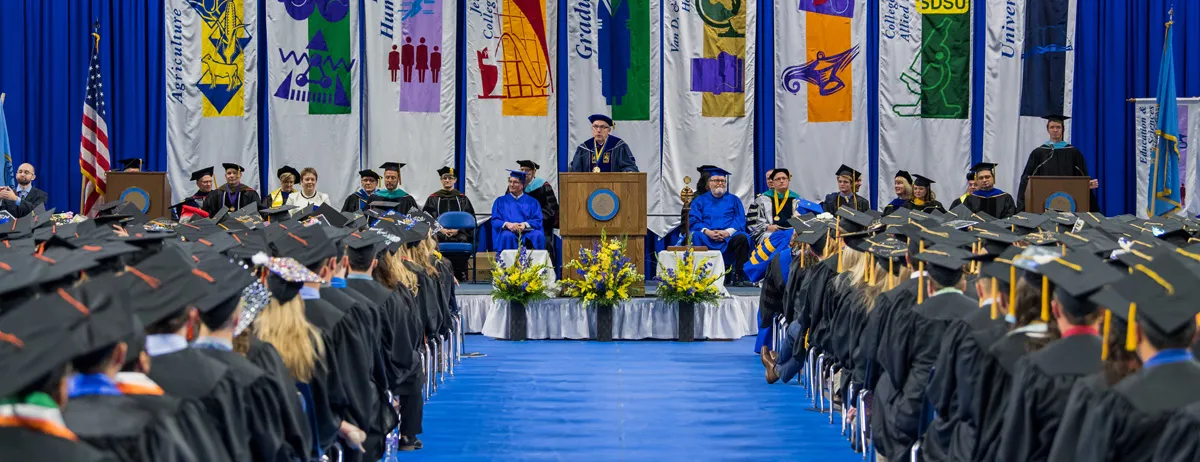 Students listening to speech