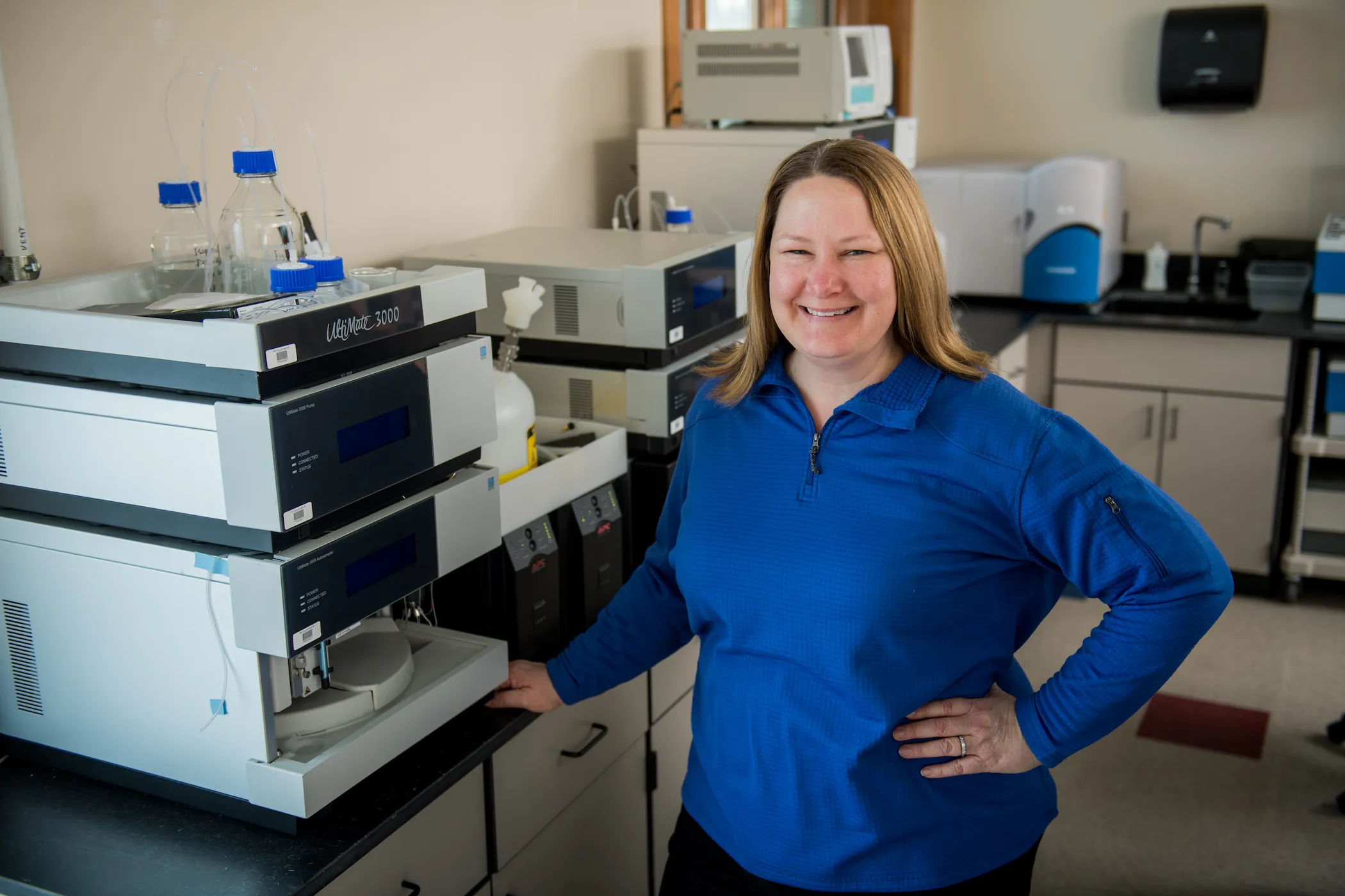 Melissa standing in a lab