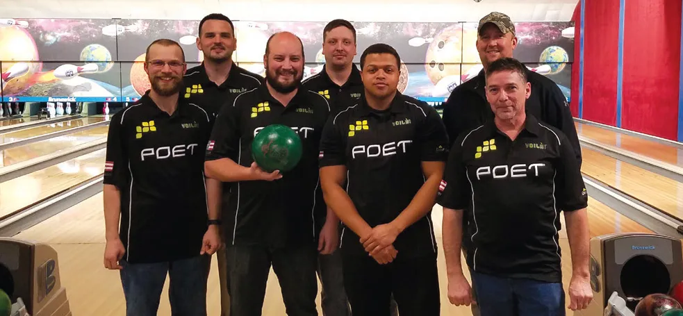 Seven people at a bowling alley