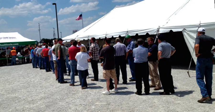 People standing in line at an exhibition