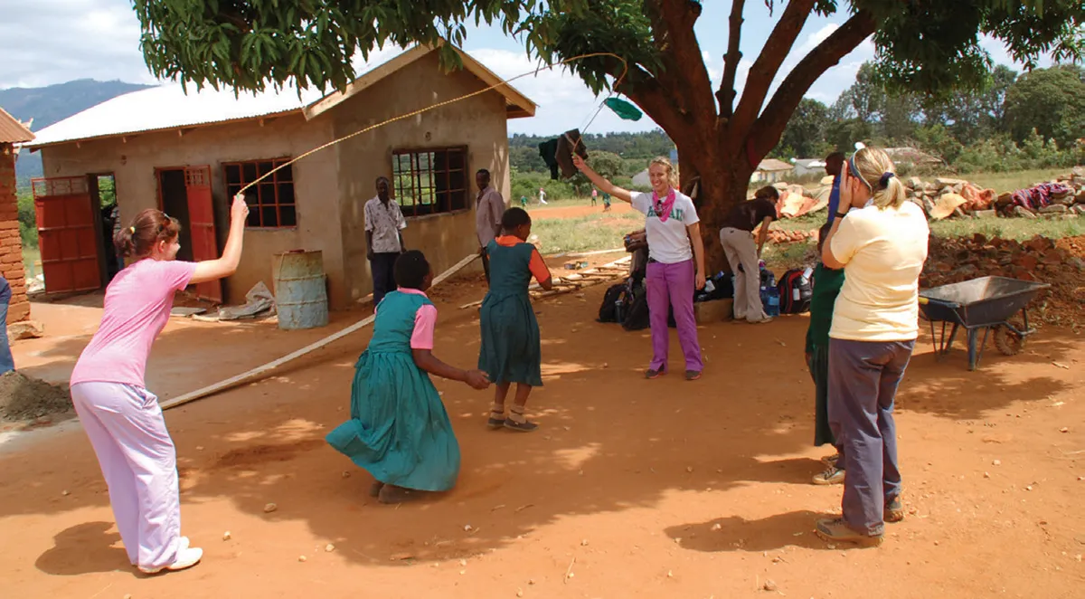 Kids and adults playing outside