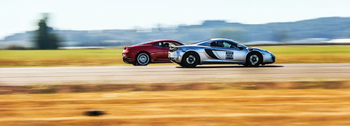 A red and a white race car