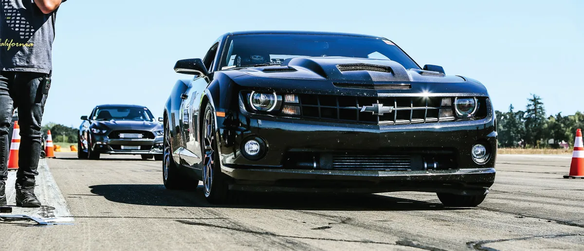 Two black race cars