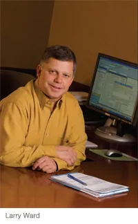Larry Ward at a desk
