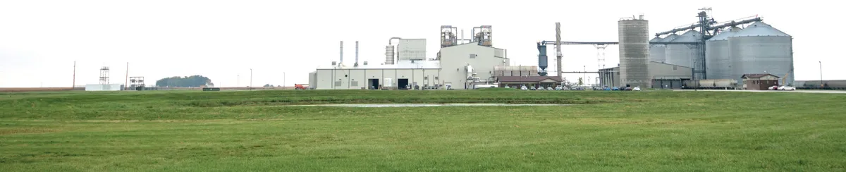 Industrial plant in a grassy field