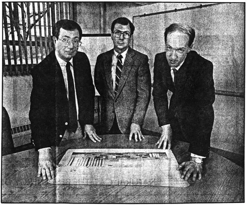 Ed Bosanko, South Dakota Wheat Growers Association, Don Patzer, Farmland Industries Inc. and Rob Broin with new plans for the Aberdeen plant.