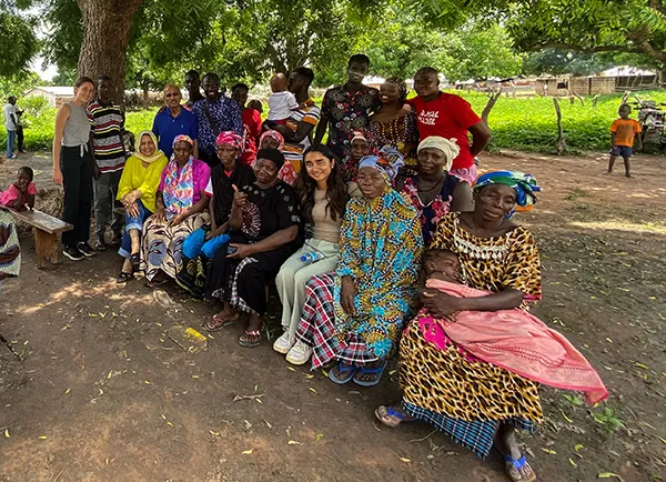 Ashna Patel and sabella Santiago Lindsay help local families in Bambara
