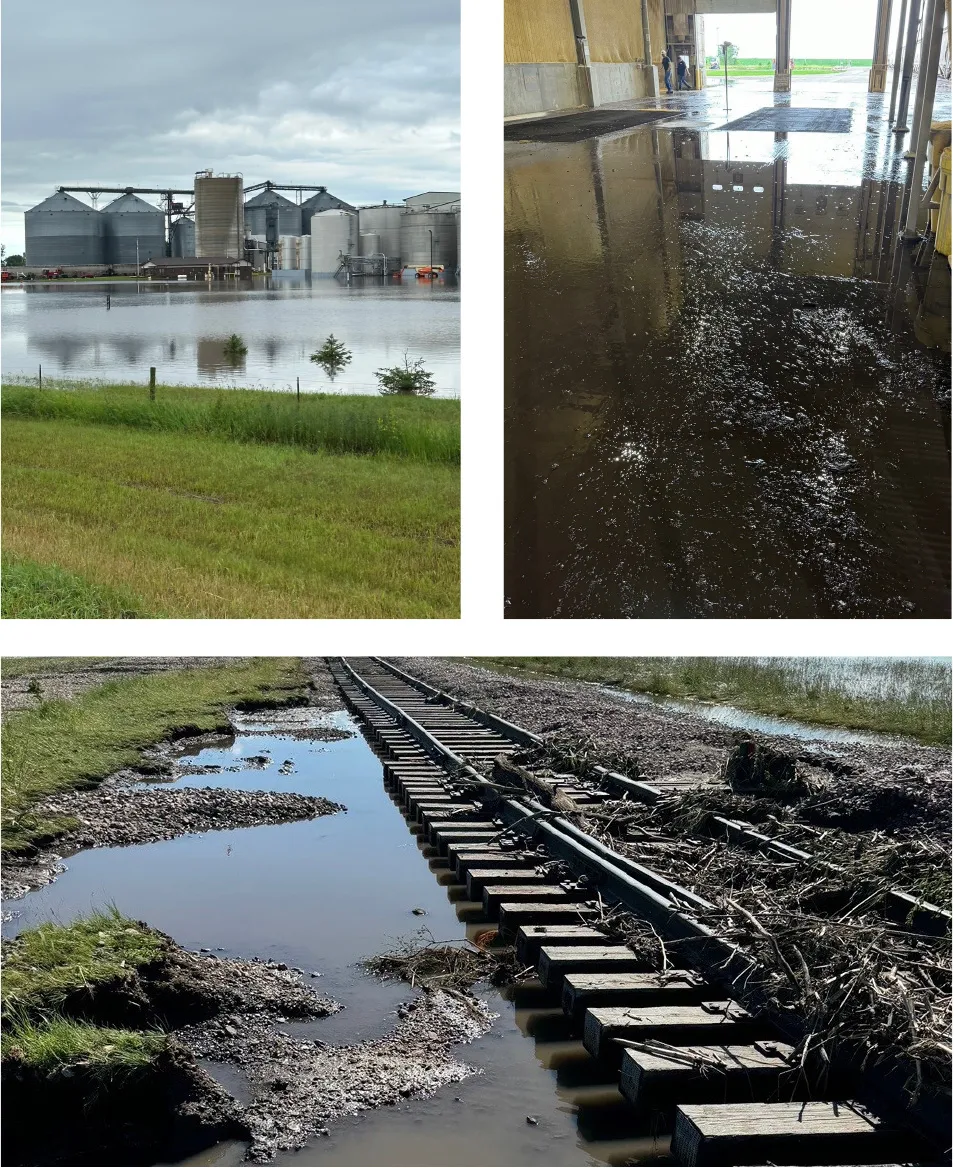 Flooded farm, warehouse, and rail tracks