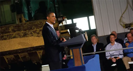 Barack Obama delivering a speech at the podium