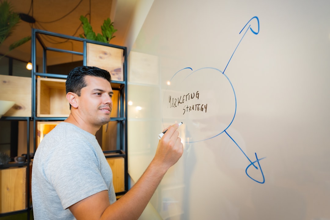 A product manager reviewing a customer feedback loop dashboard showing request status, votes, and closed loop communications