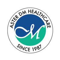 Logo of Aster DM Healthcare with stylized initials 'aM' in blue and green circle, surrounded by text 'Aster DM Healthcare Since 1987'.