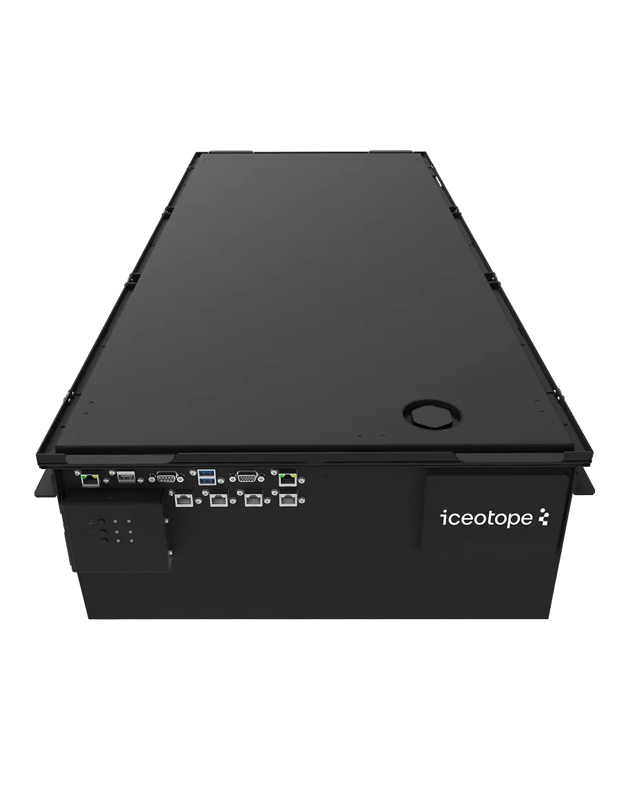 Black rectangular electronic device with multiple ports and connectors on one side, labeled with the brand name iceotope.