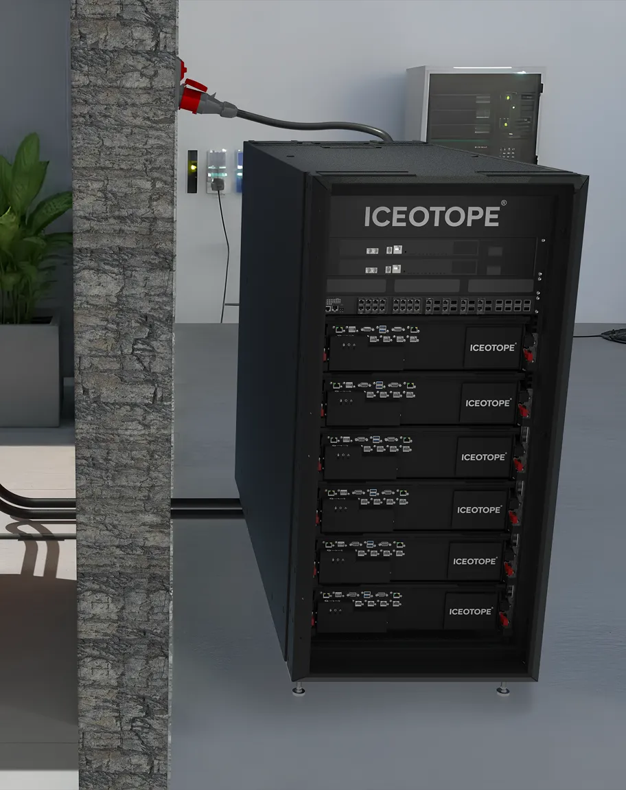 Tall black server rack labeled ICEOTOPE with multiple connected components in a modern industrial room.