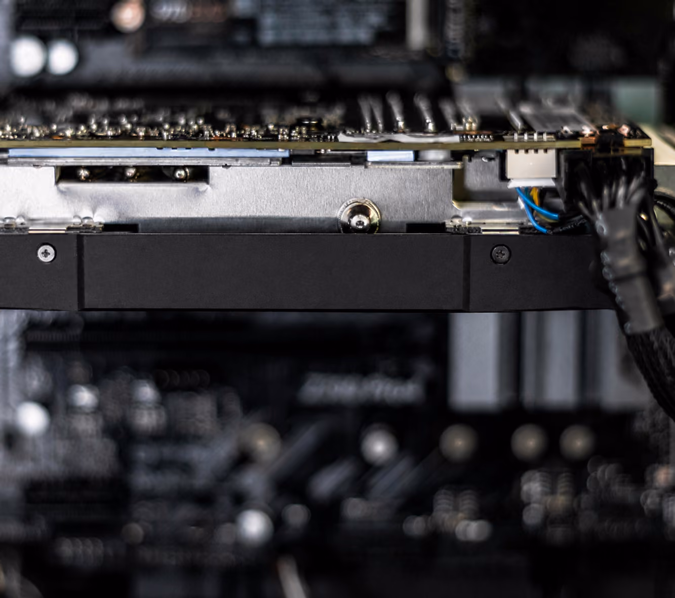 Close-up of a GeForce RTX graphics card installed inside a computer.