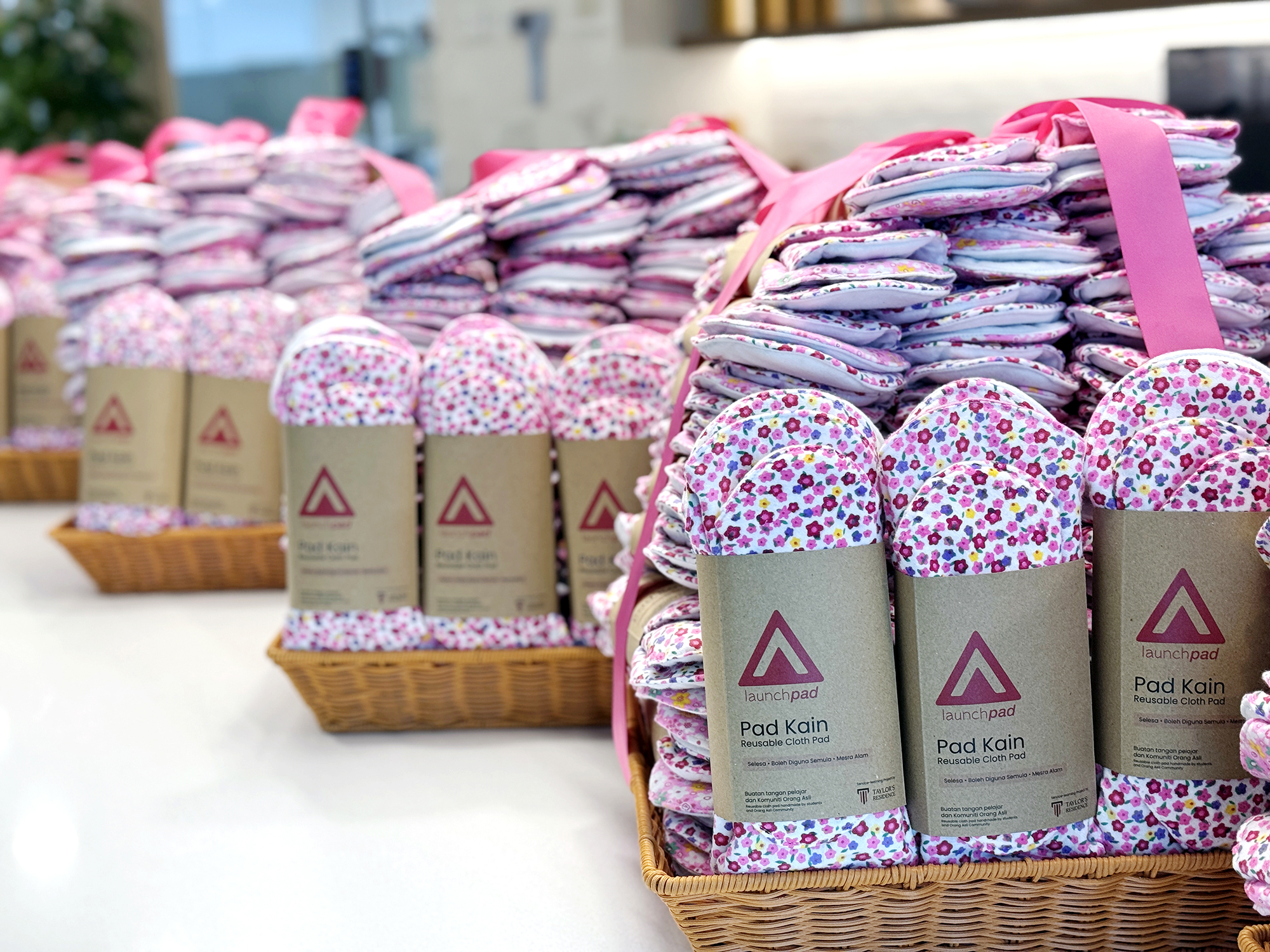 LaunchPad reusable cloth pad sets prepared for distribution to Orang Asli women as part of the menstrual health initiative.