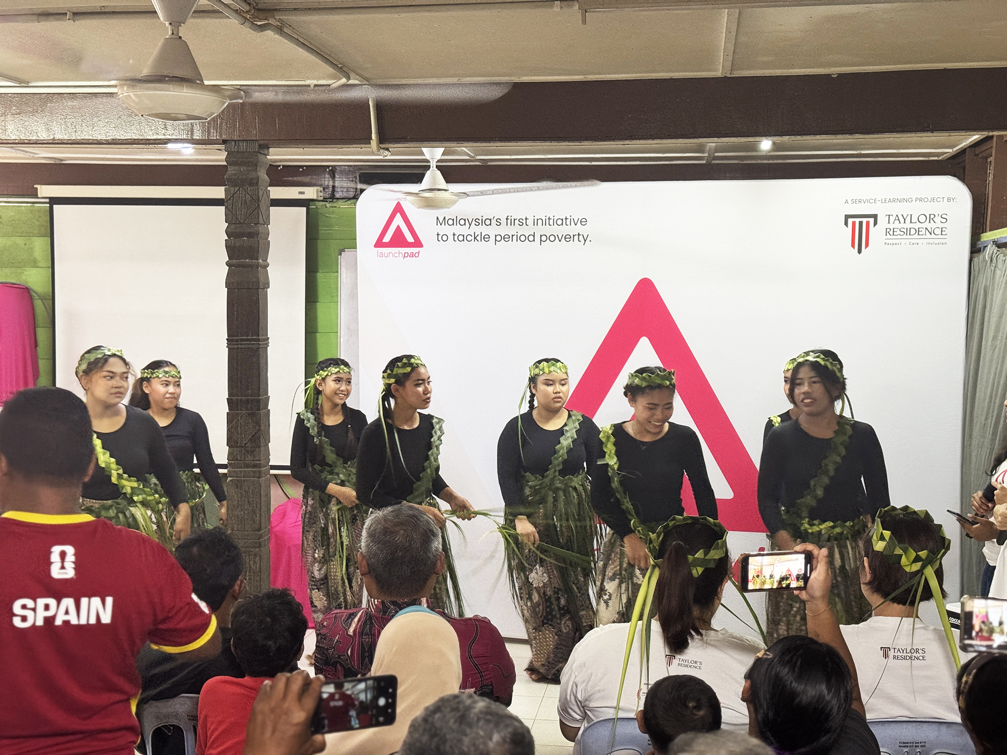 Orang Asli performers presenting a traditional cultural sewang dance during the LaunchPad Community Showcase in Kampung Serendah.